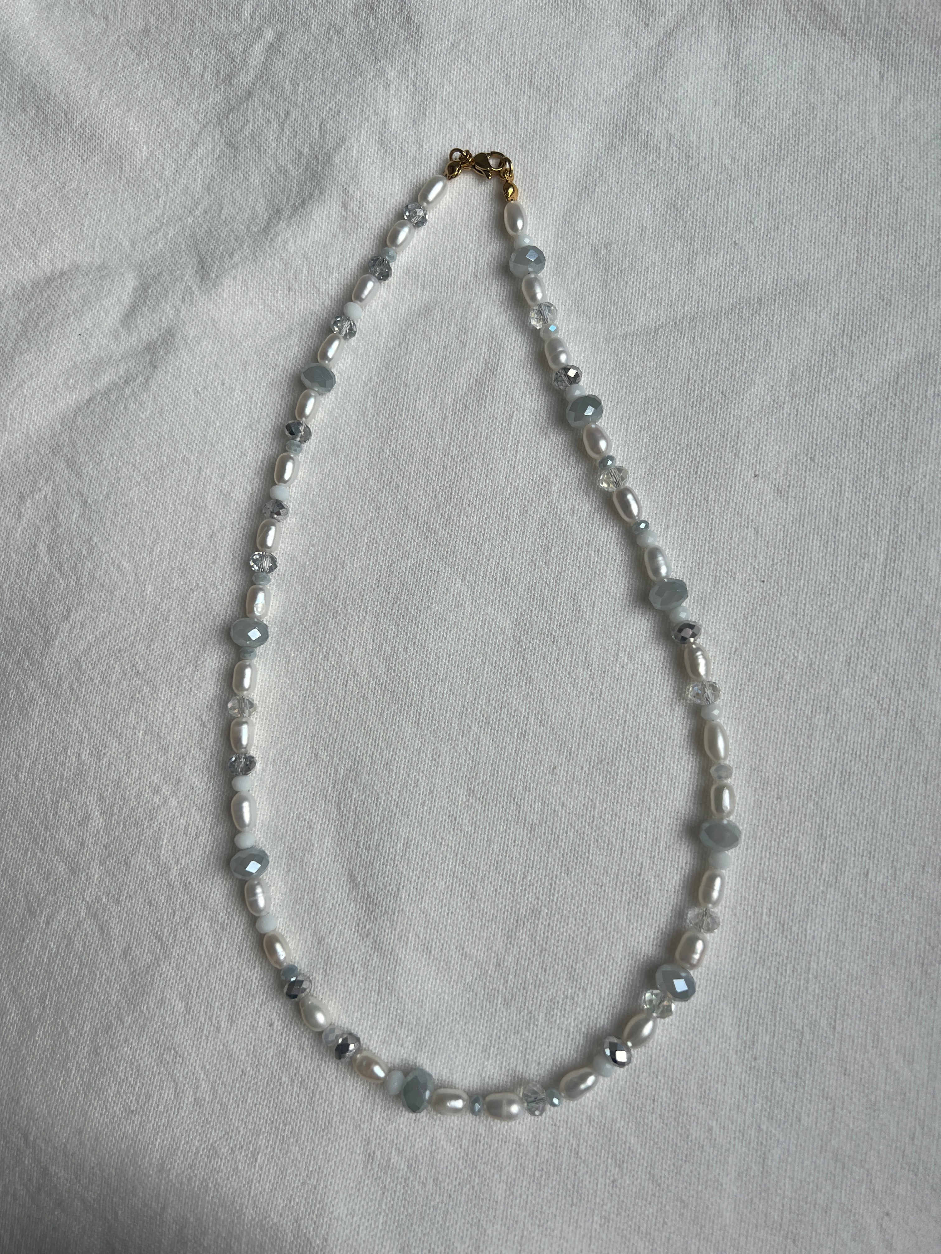 white & silver pearl necklace